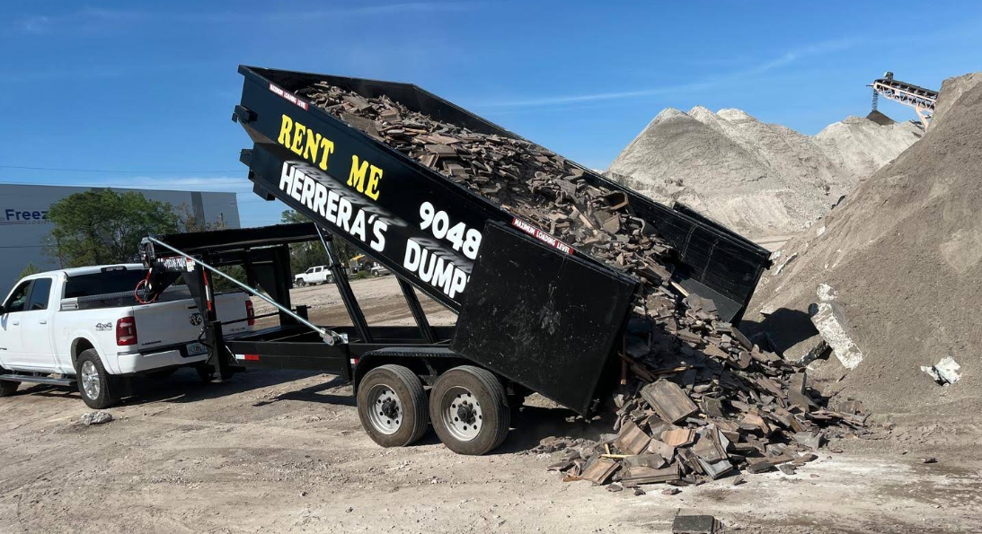Herrera Jax Properties dumpster truck unloading construction debris